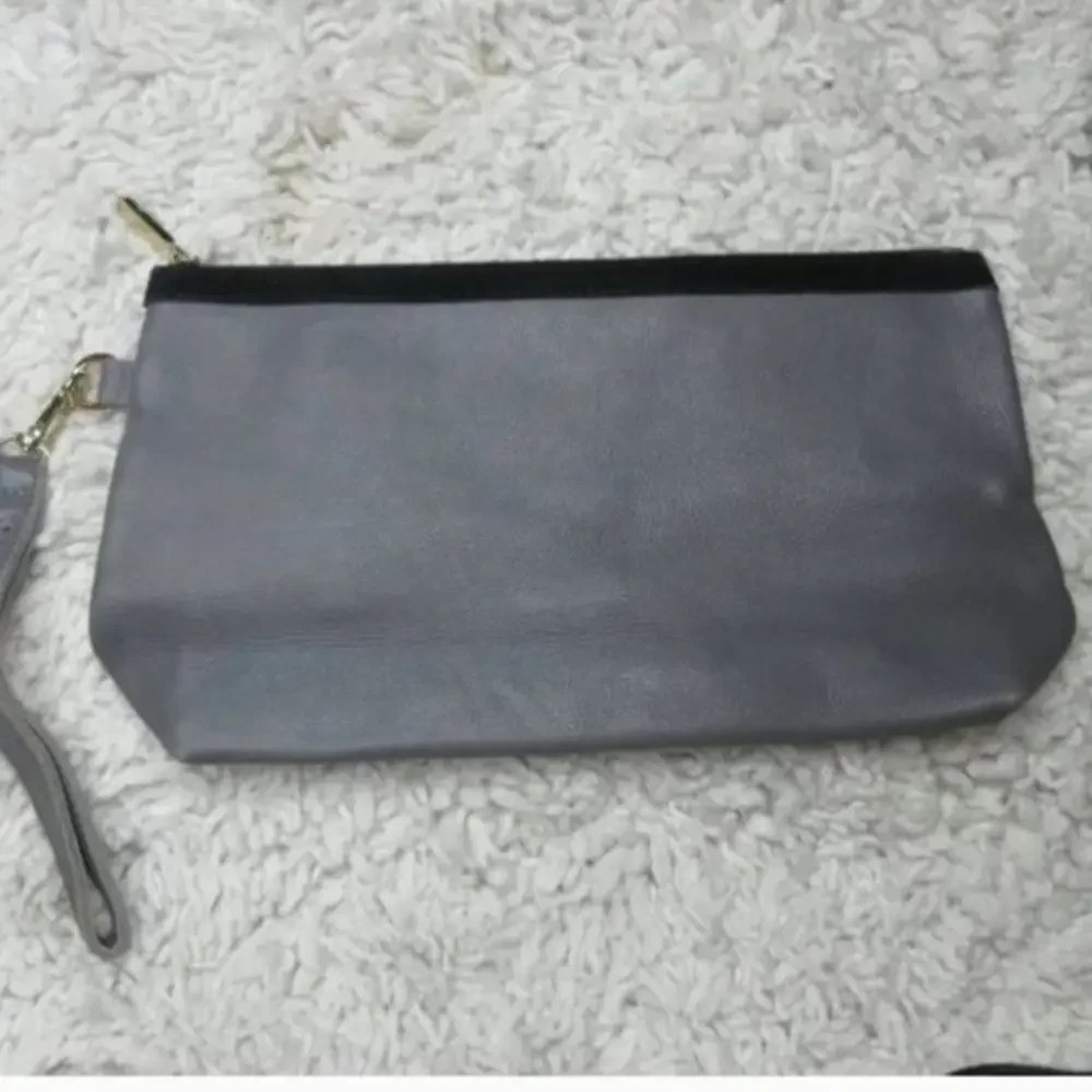 Cincinati leather boutique clutch/ make up bag‎